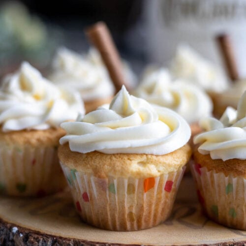 RumChata cupcake with beautiful icing on a rustic board