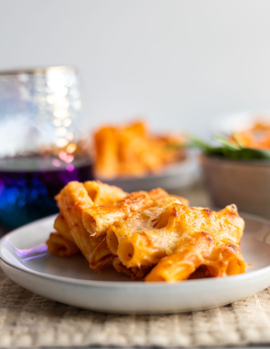 A piece of golden 5 ingredient baked ziti ready to be enjoyed!